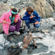 Two mountaineers with Otzi, Europe’s oldest natural human mummy, in the Otztal Alps between Austria and Italy in September 1991.